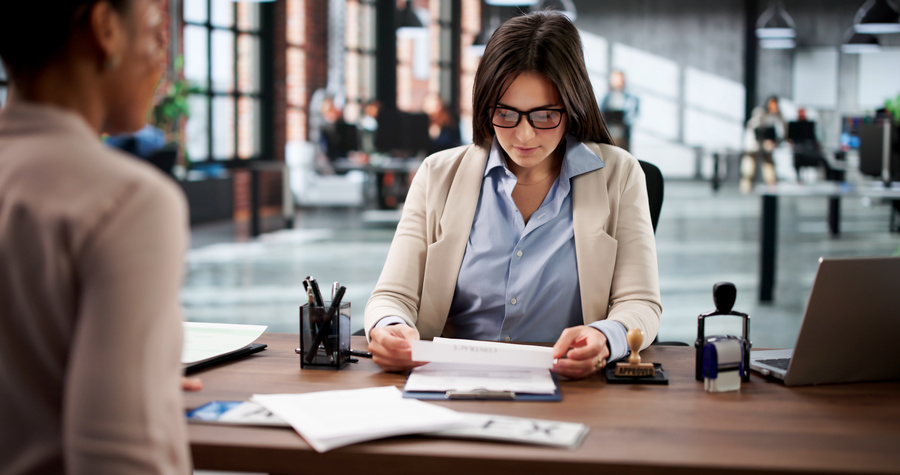 female bookkeping expert calculating taxes