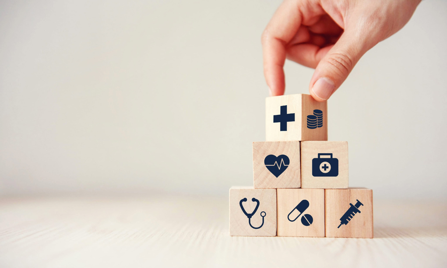 health insurance concept shown by wooden blocks